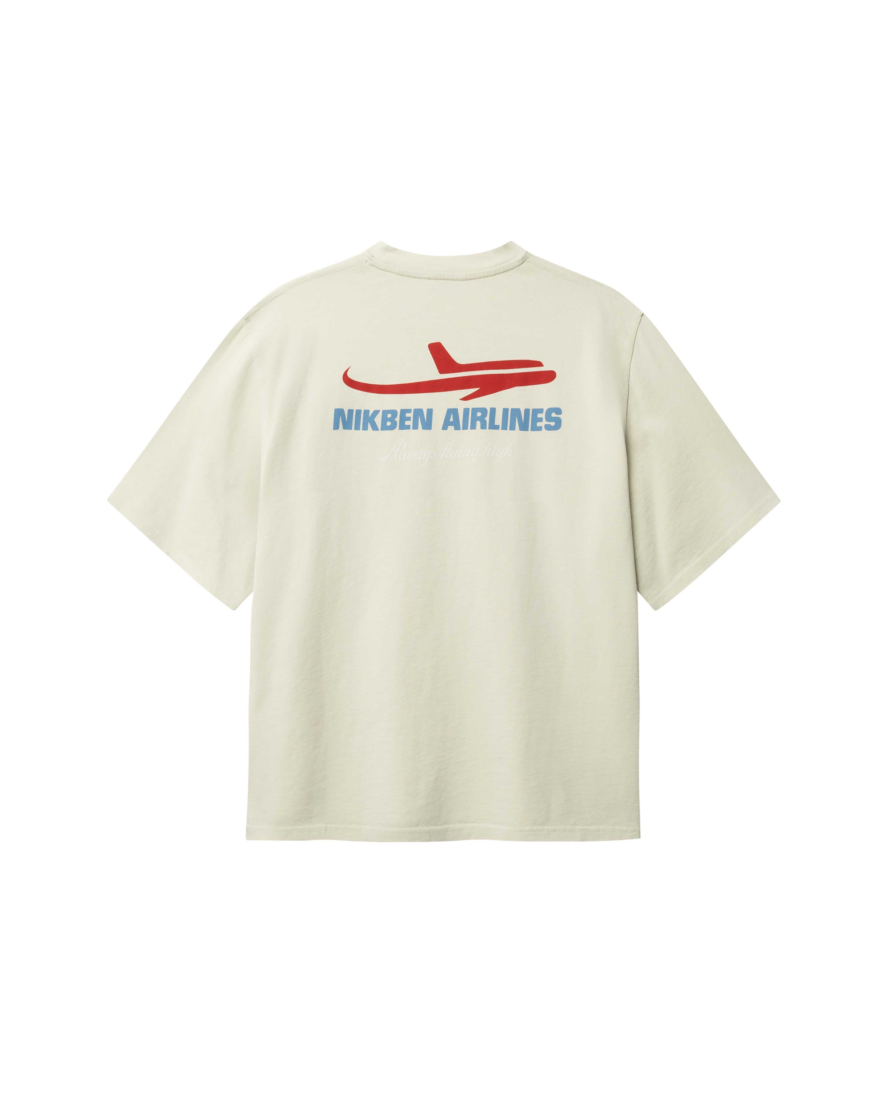 Back of light grey T-shirt with blue Nikben Airlines logo and red airplane print 