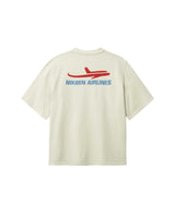 Back of light grey T-shirt with blue Nikben Airlines logo and red airplane print 