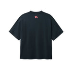 Back of black T-shirt with pink flag print on the neck