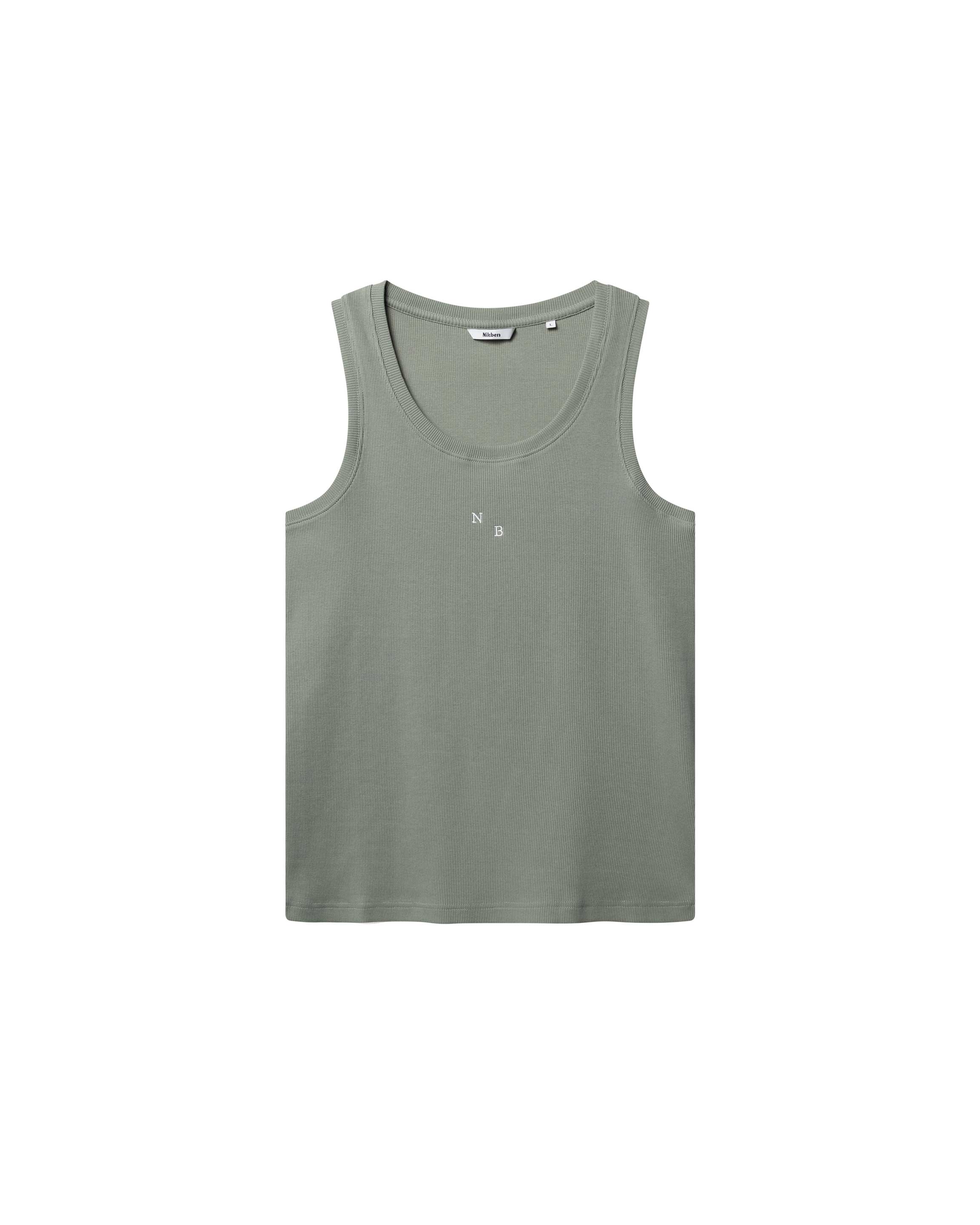 Green ribbed tank top with white NB initials on chest