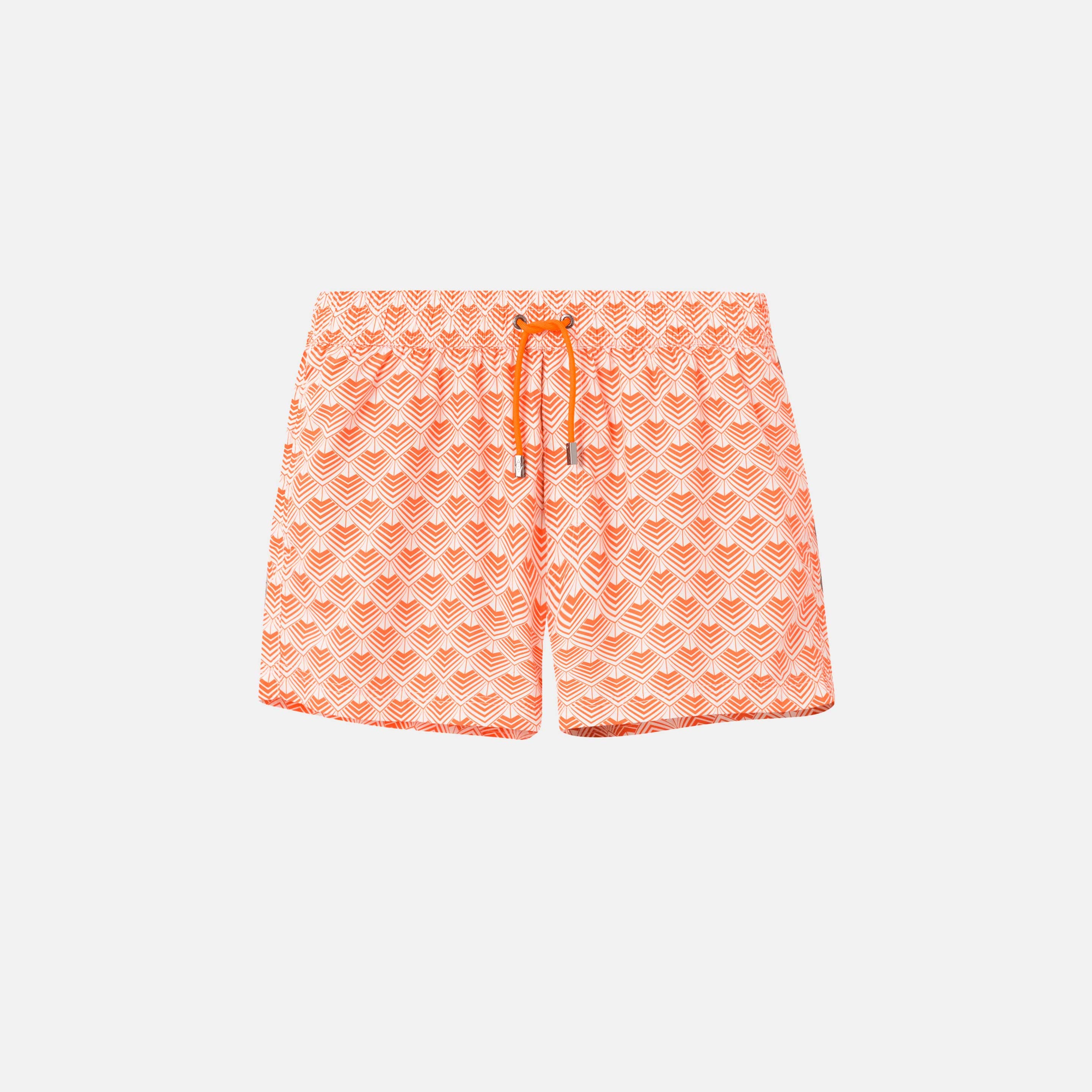 Orange and white patterned swimming trunks. Short length with drawstring and two side pockets.