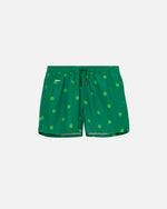 Green swim trunks with light green dots print. Mid length shorts with drawstring waistband and two side pockets.