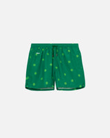 Green swim trunks with light green dots print. Mid length shorts with drawstring waistband and two side pockets.