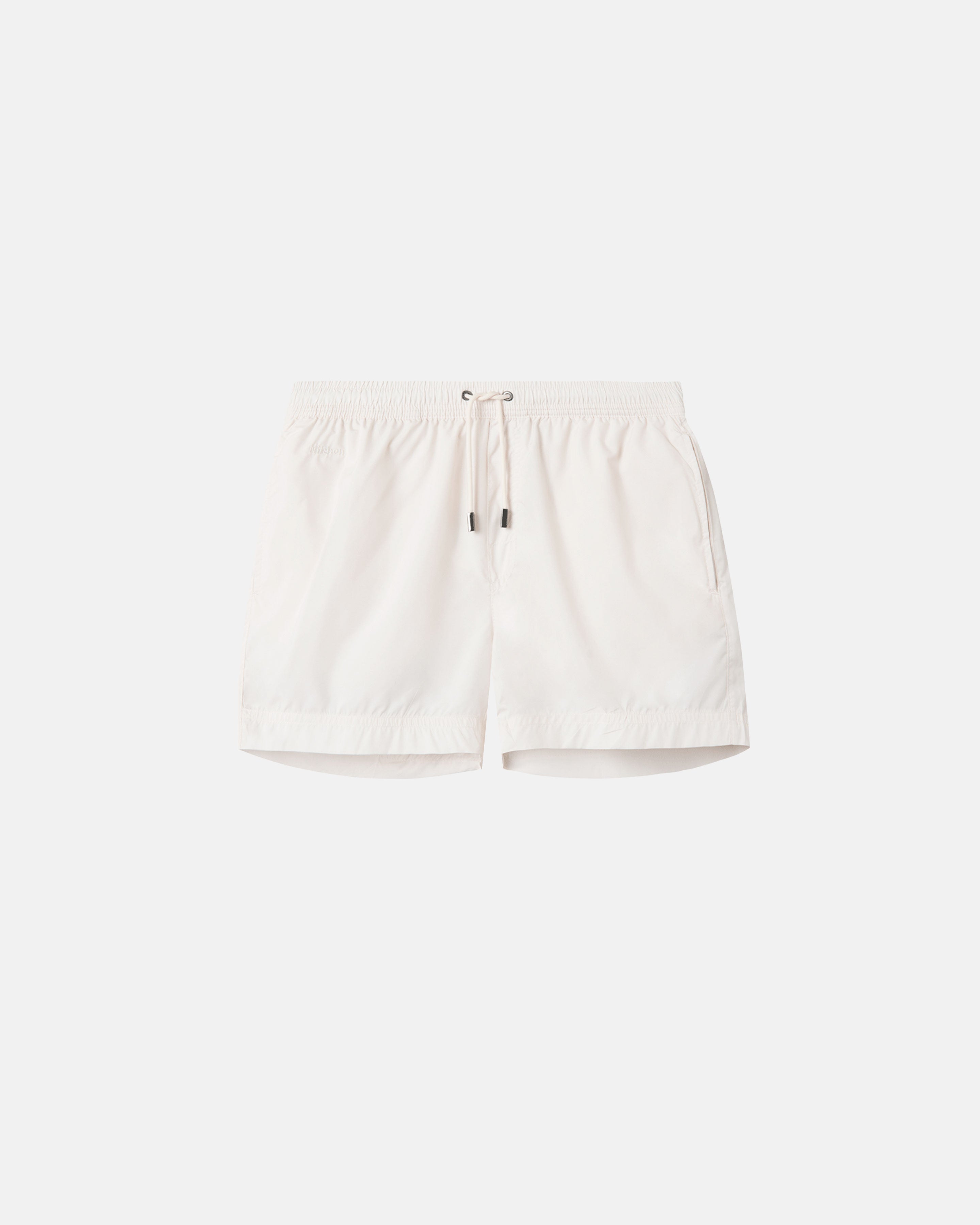 Cream white swim trunks. Mid length with drawstring and two side pockets.