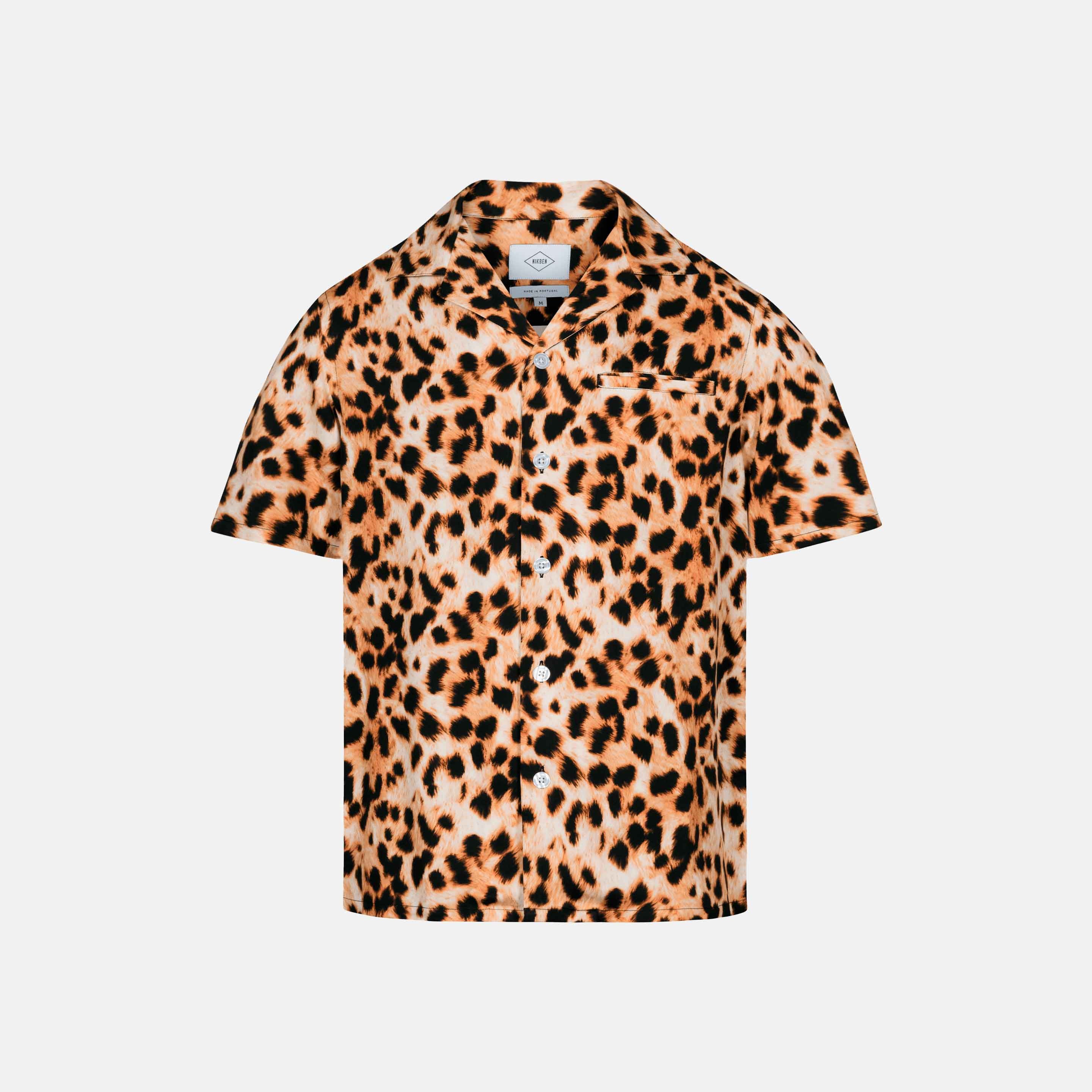 Leopard printed short sleeve vacation shirt with white pearl buttons
