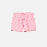 Pink and white swim trunks