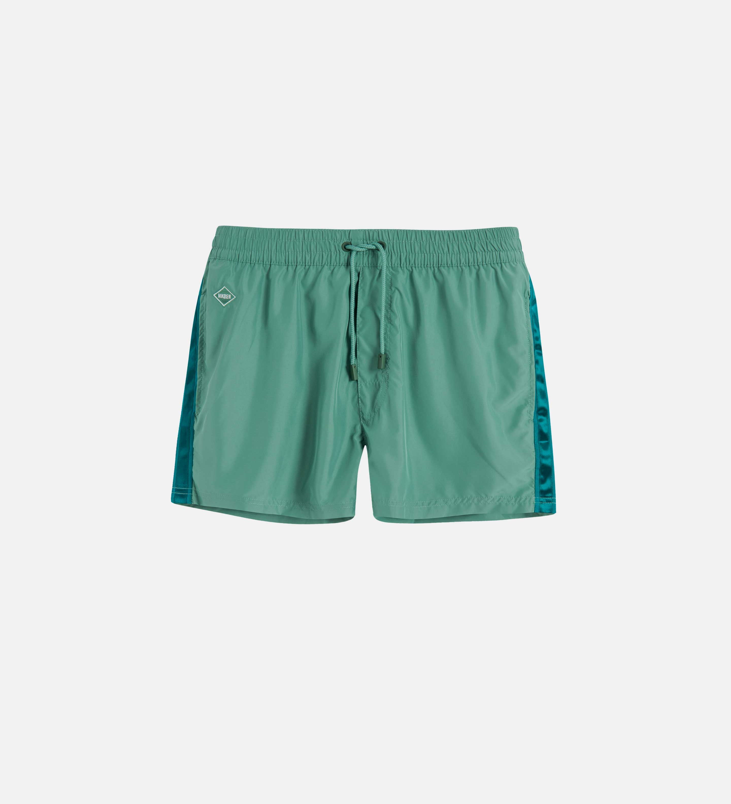 Green swim trunks with dark green stripes