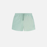Mint green waffle-patterned short-length shorts with two front pockets and a drawstring.