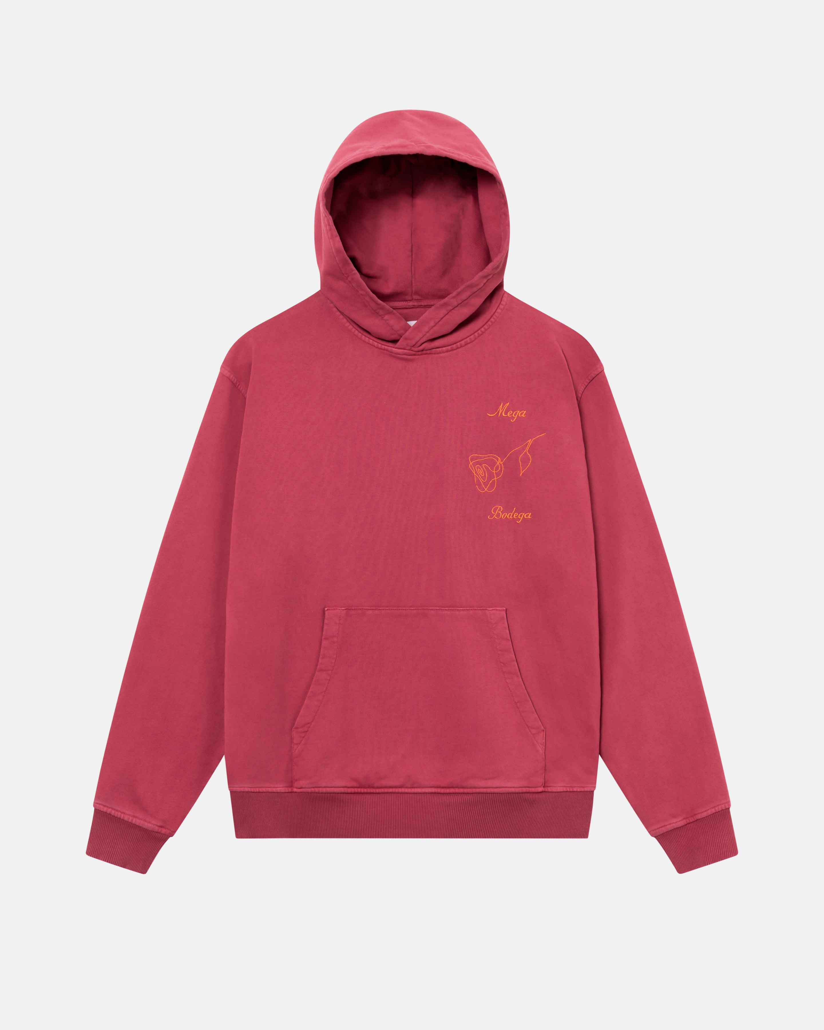 A burgundy hoodie with orange chest embroidery