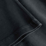 Close-up of sleeve and stitching on washed black T-shirt