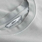 Close-up of round neck and stitching on washed grey T-shirt
