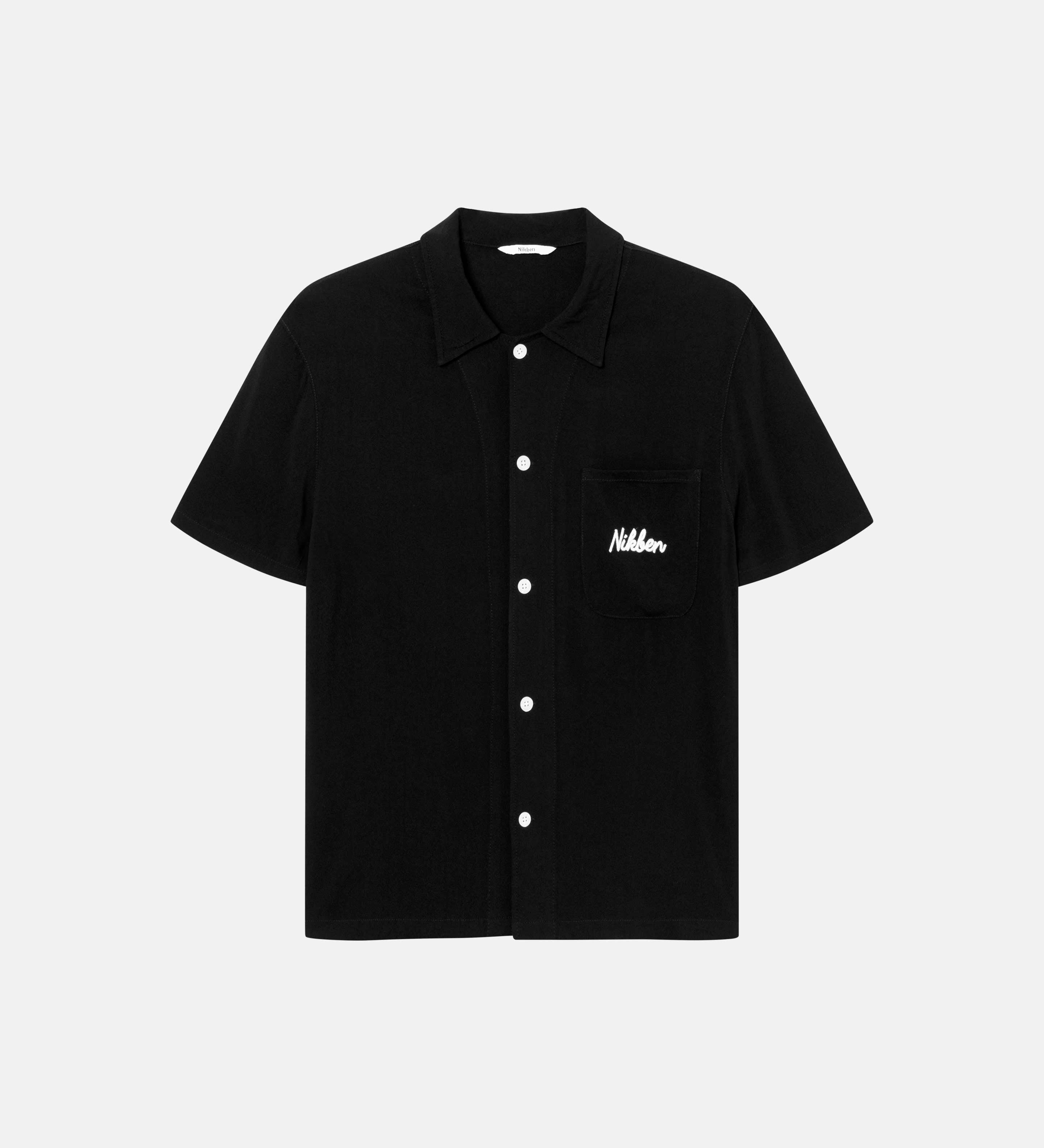 Black short-sleeved shirt with white button closure and embroidered Nikben logo on breast pocket