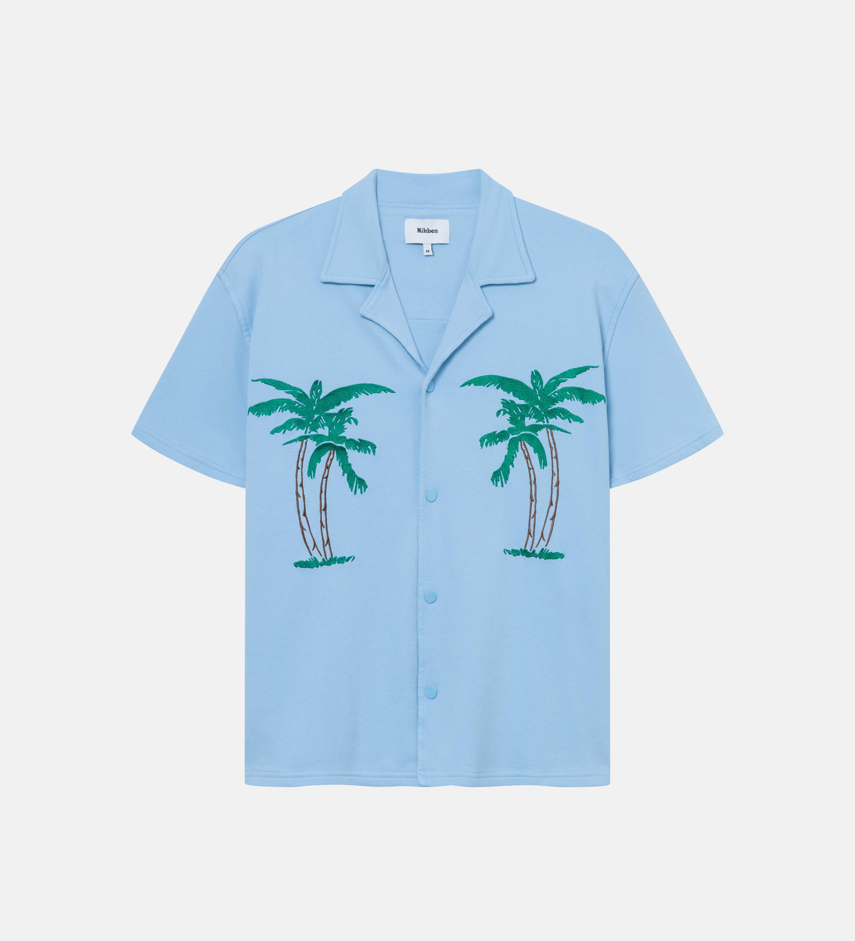 Sky blue short-sleeved shirt with palm tree embroidery