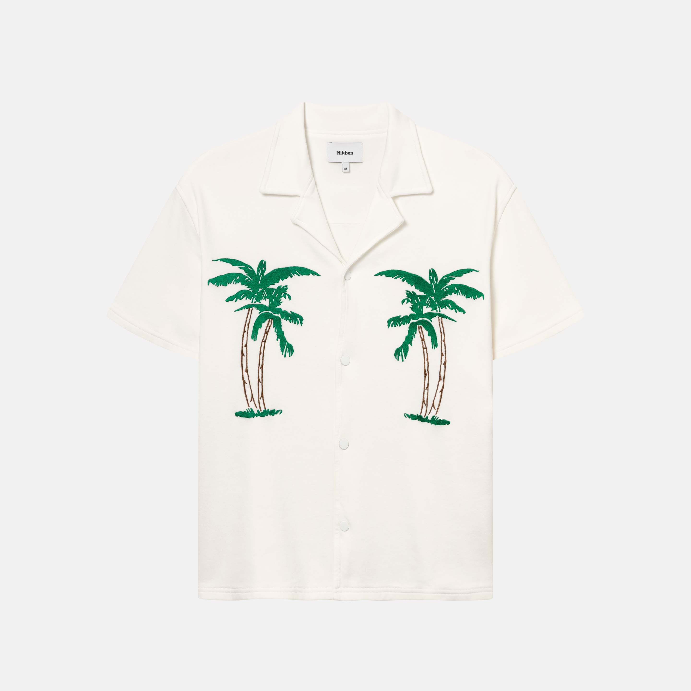 White short-sleeved shirt with palm tree embroidery