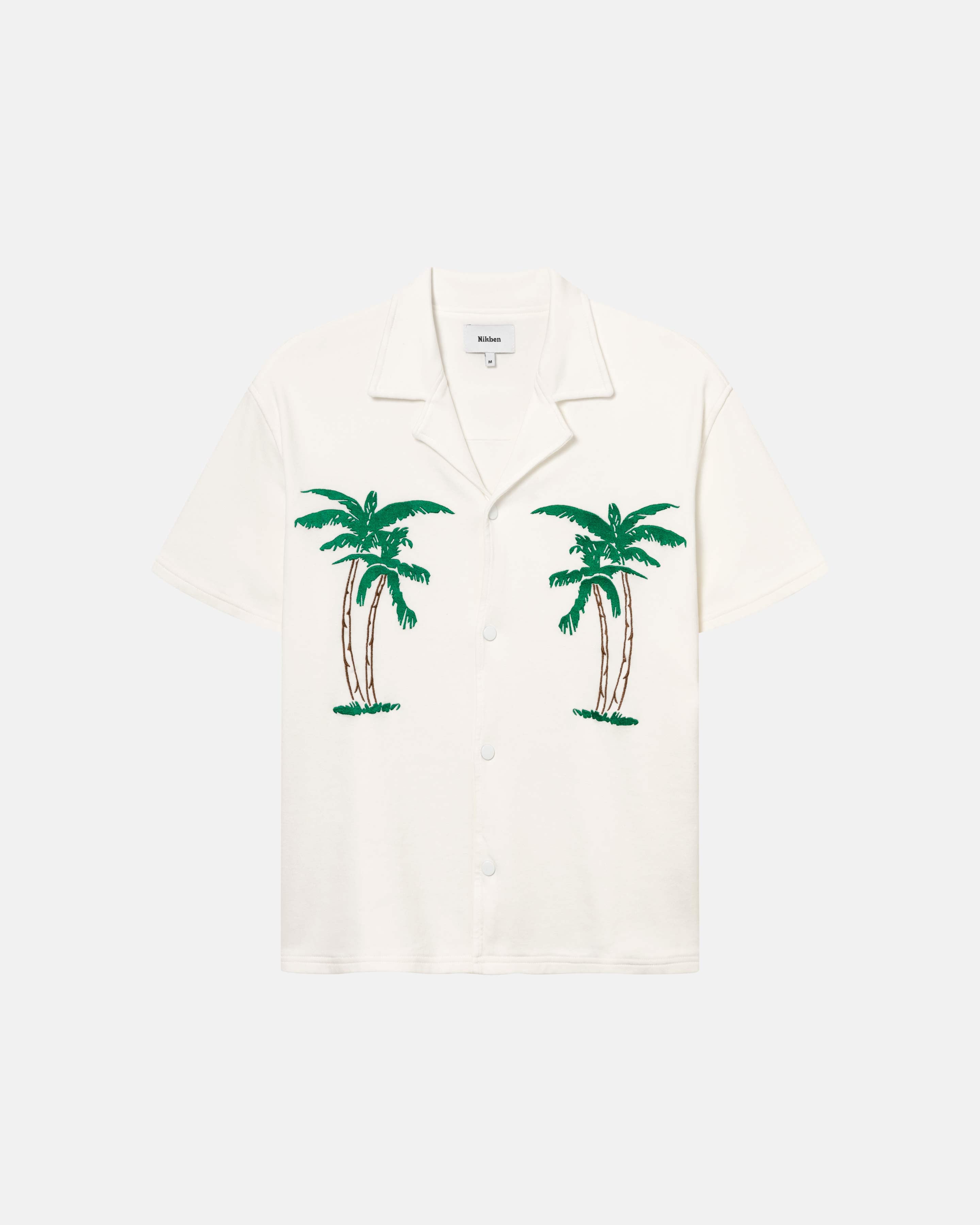 White short-sleeved shirt with palm tree embroidery