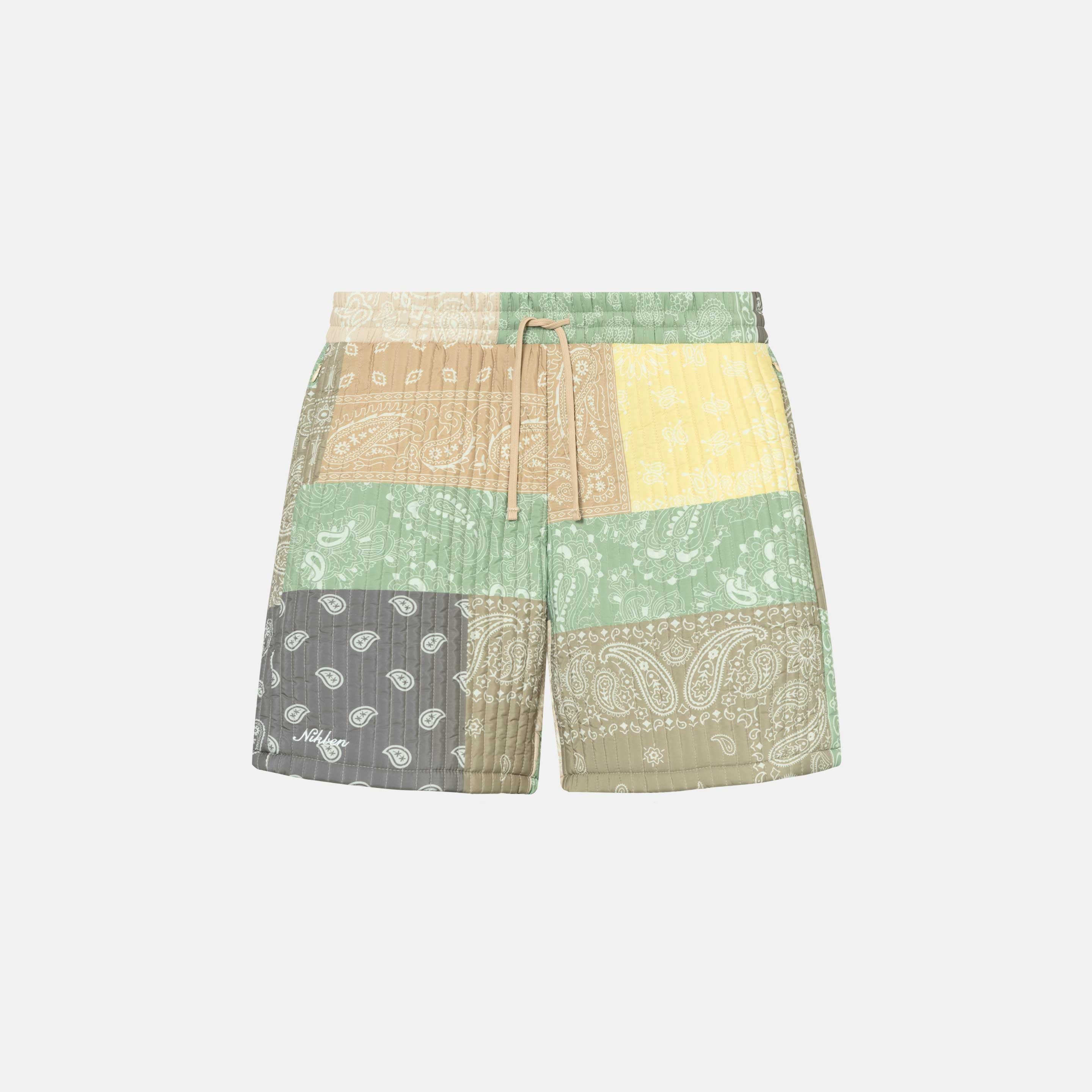 Quilted shorts with elastic drawstrings and multi colored paisley pattern