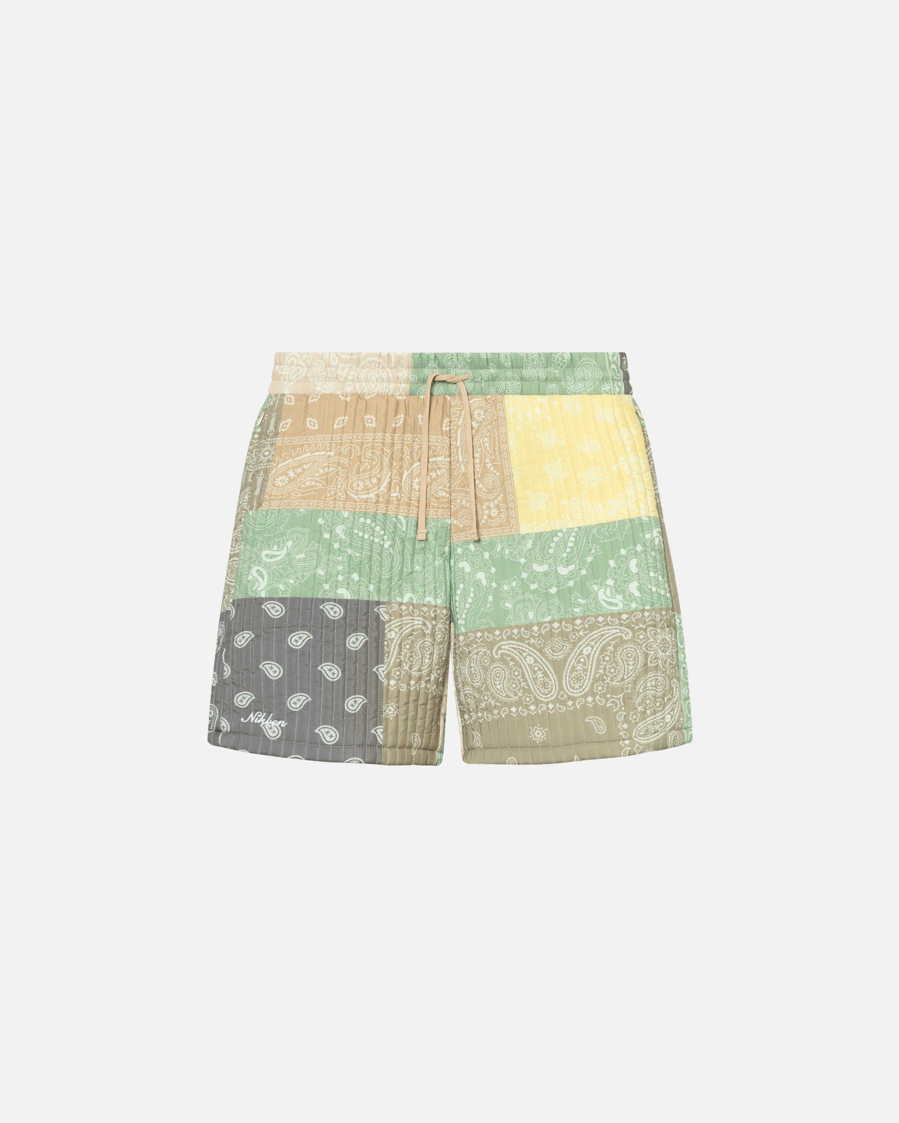 Quilted shorts with elastic drawstrings and multi colored paisley pattern