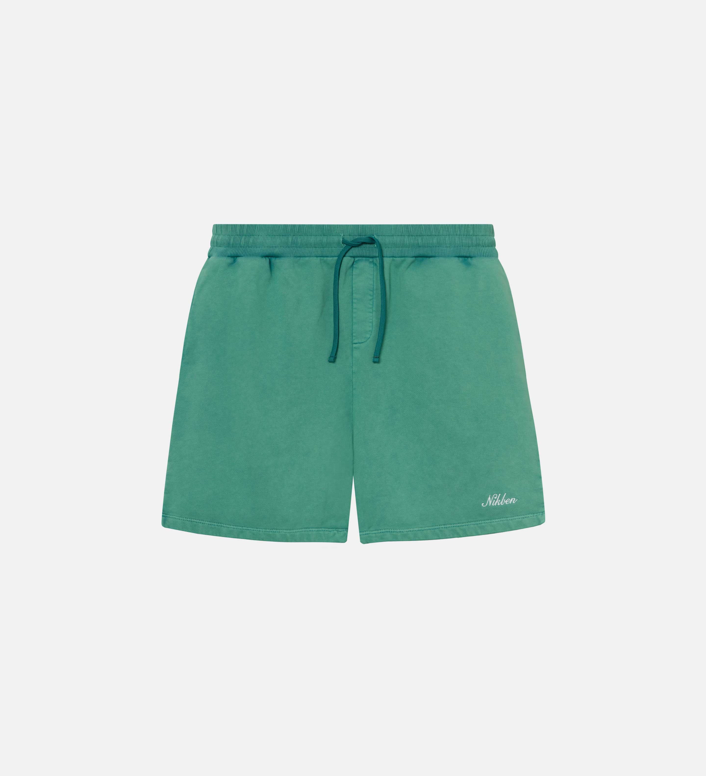 Green sweatshorts with elastic drawstrings and an embroidered script logo on the front leg