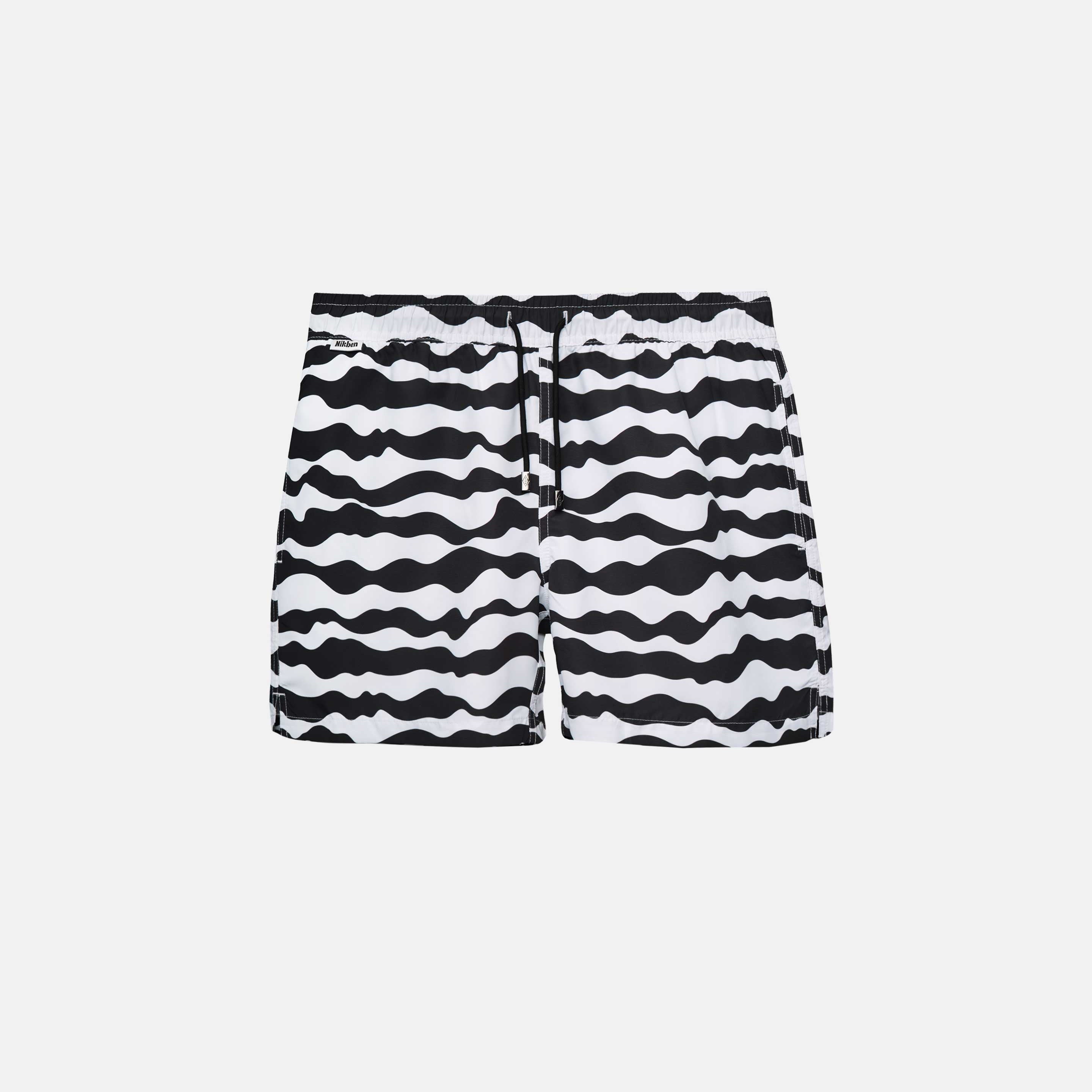 Black and white mid length swim trunks. Mid length with drawstring and two side pockets.