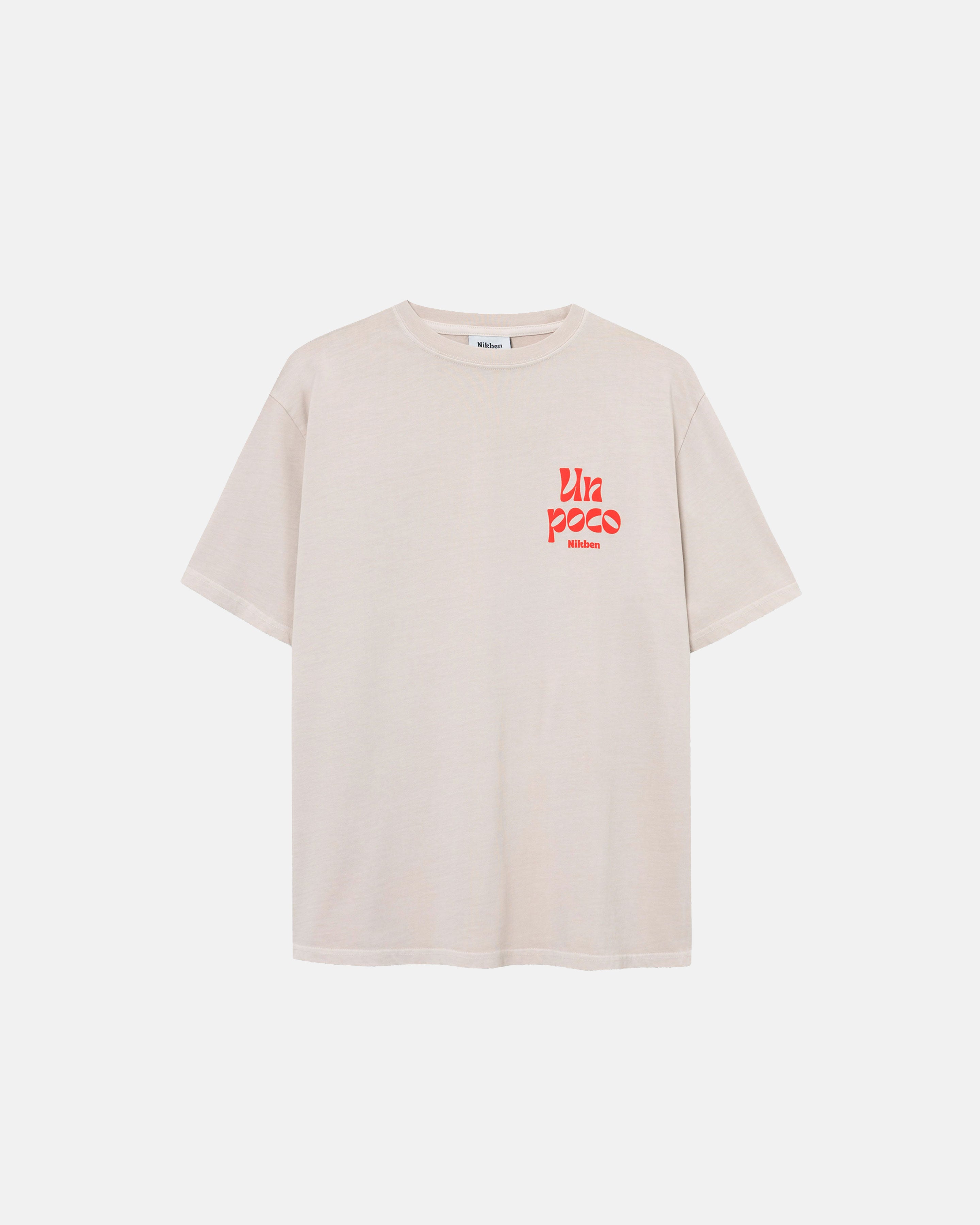 Cream colored t-shirt with red logo on chest.