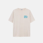 Cream colored t-shirt with blue puffy print logo on the chest.