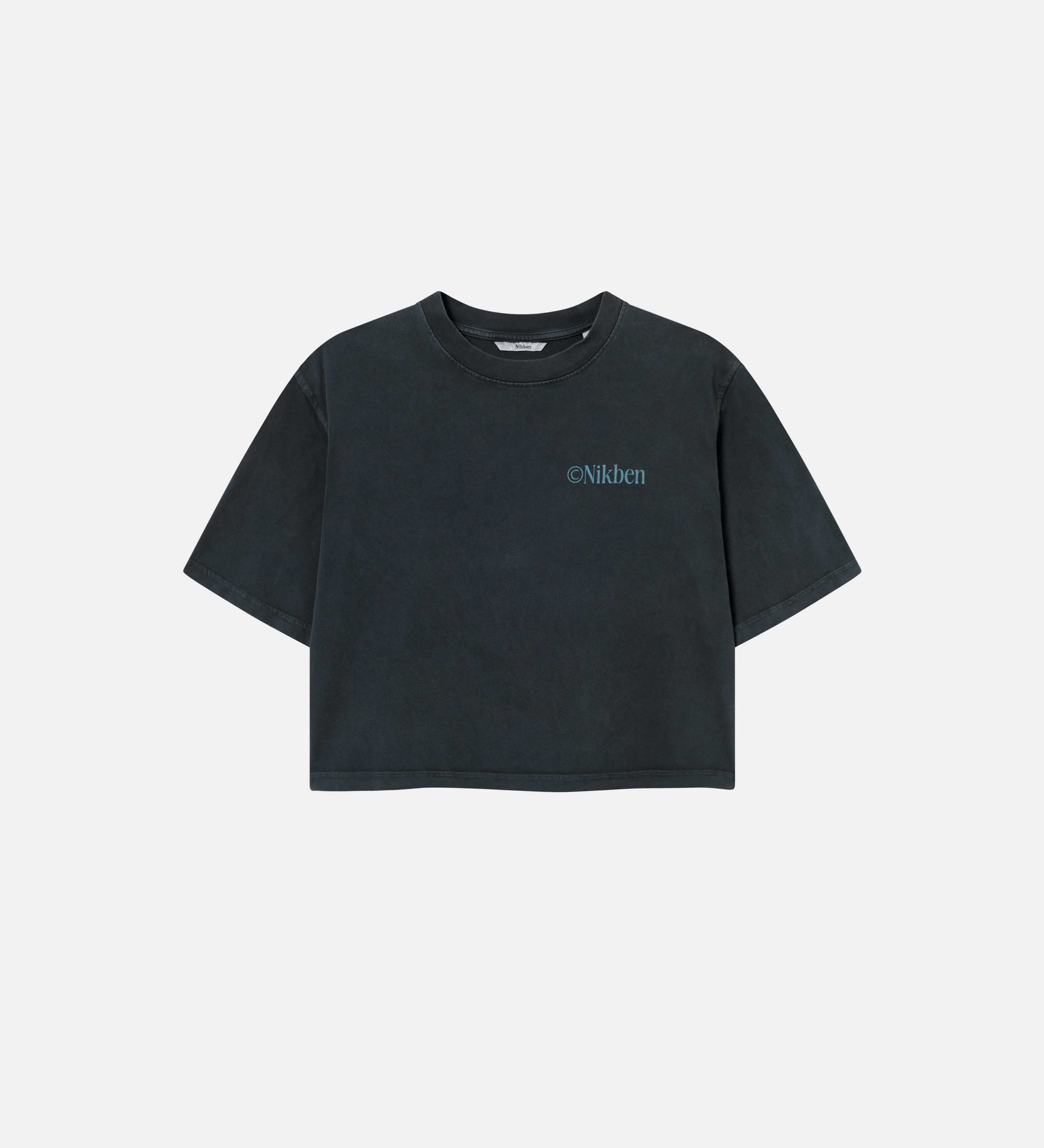 A black garment dyed cropped t-shirt with a green Nikben chest logo