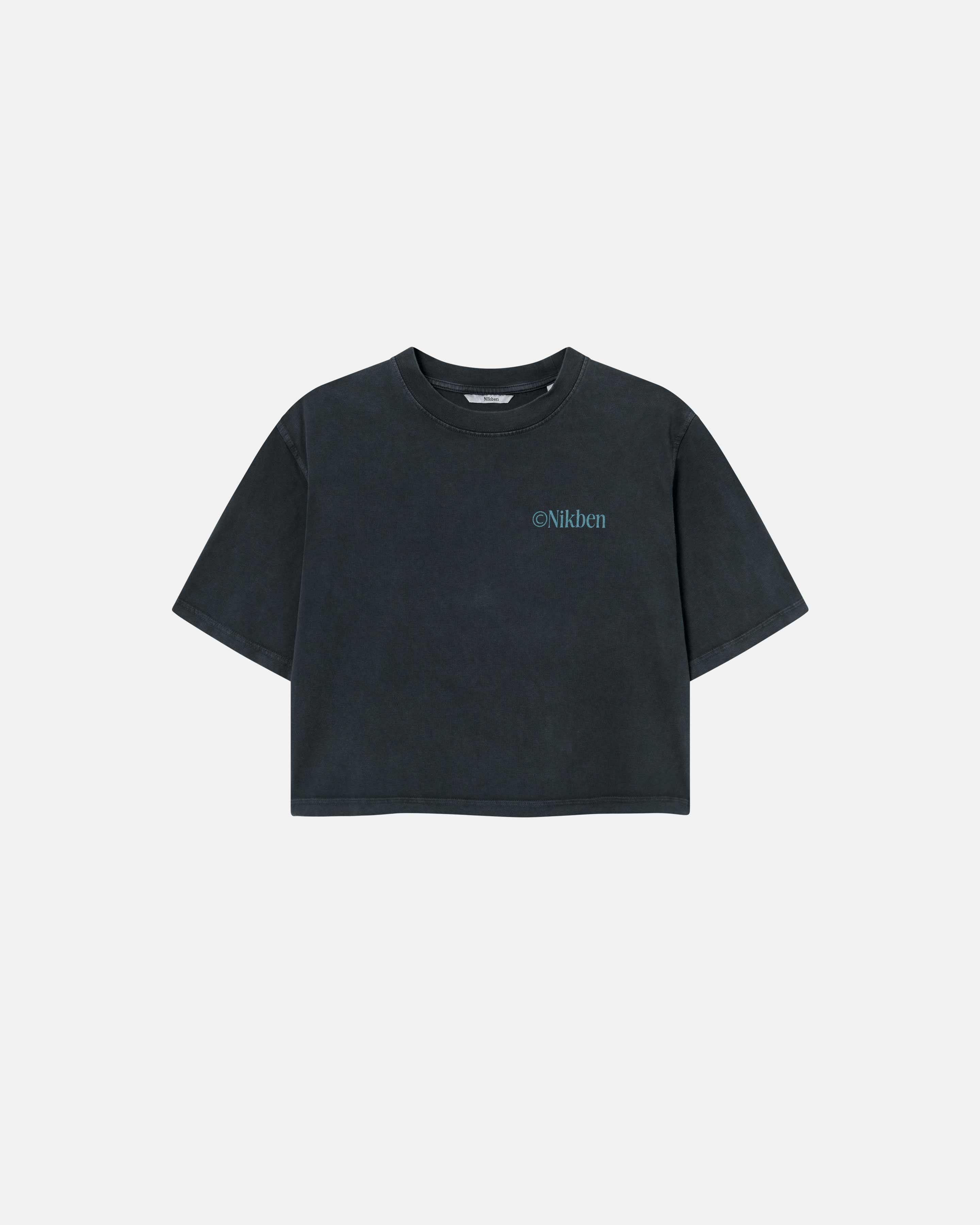 A black garment dyed cropped t-shirt with a green Nikben chest logo