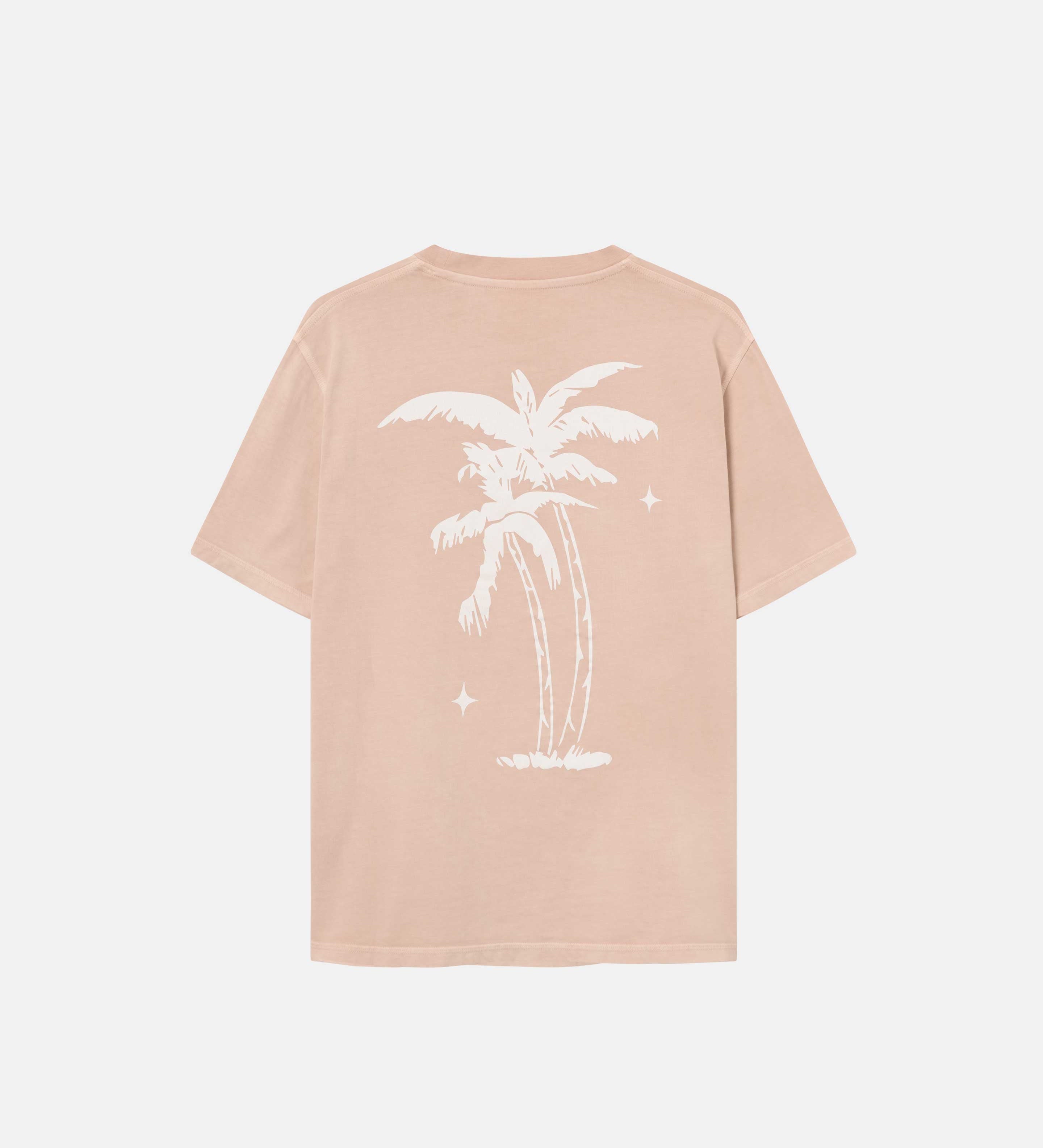 A sand colored t-shirt with palm print on its back