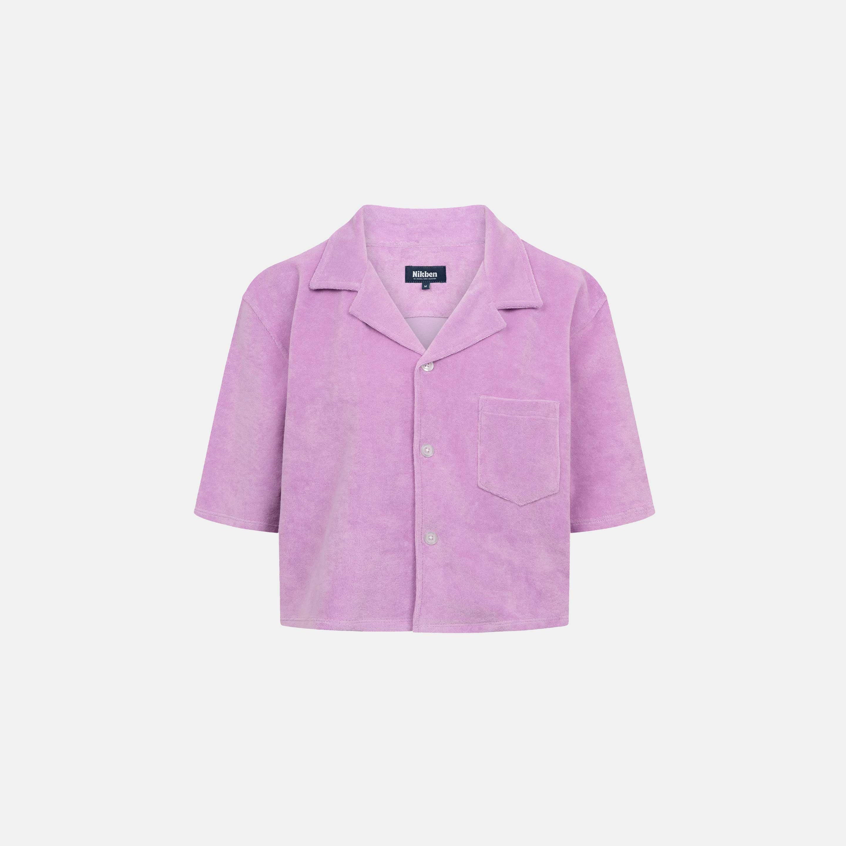Purple, short sleeve, cropped shirt with white button closure and one chest pocket
