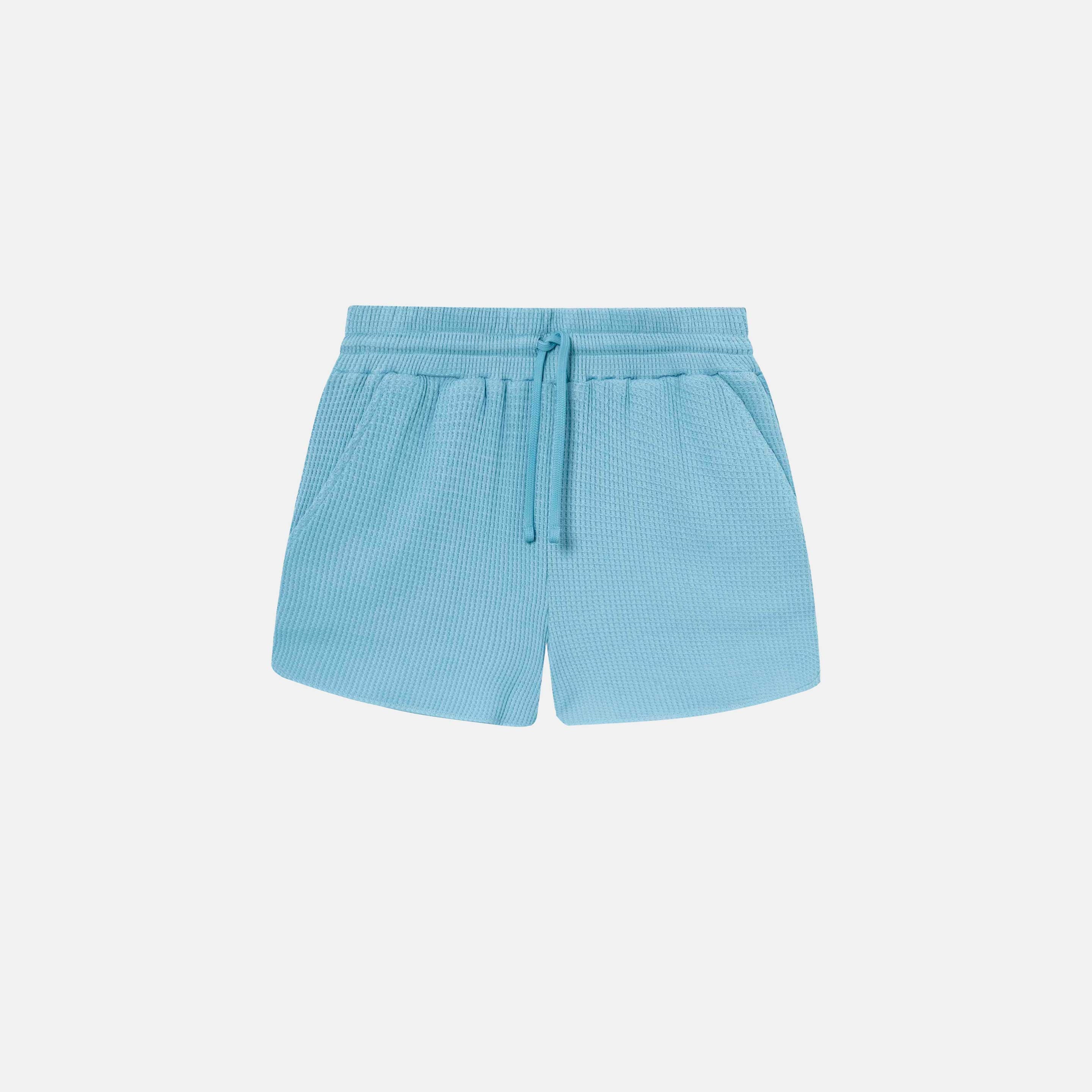 Sky blue waffle-patterned short-length shorts with two front pockets and a drawstring.