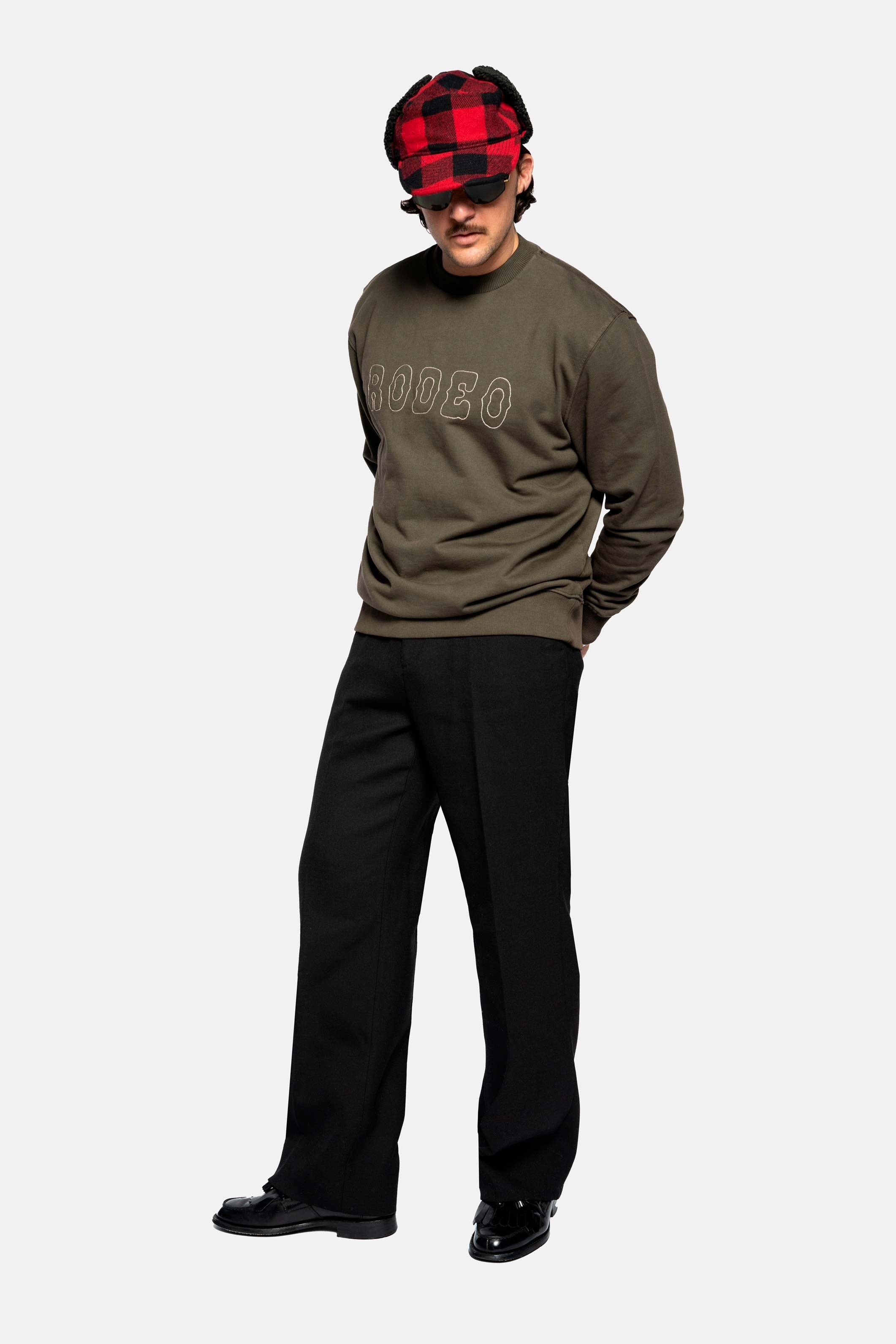 Male model wearing a Tarmac colored sweatshirt with 