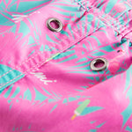 Close up of pink printed kids swim trunks