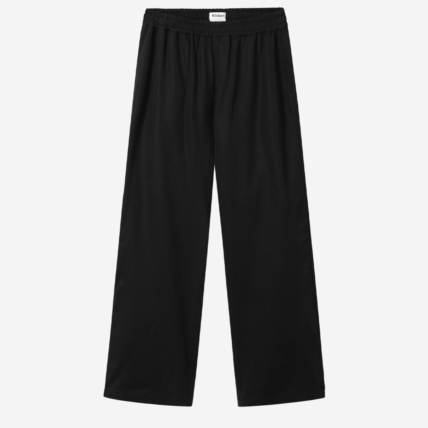 Black vacation pants with two front pockets and an elastic drawstring.