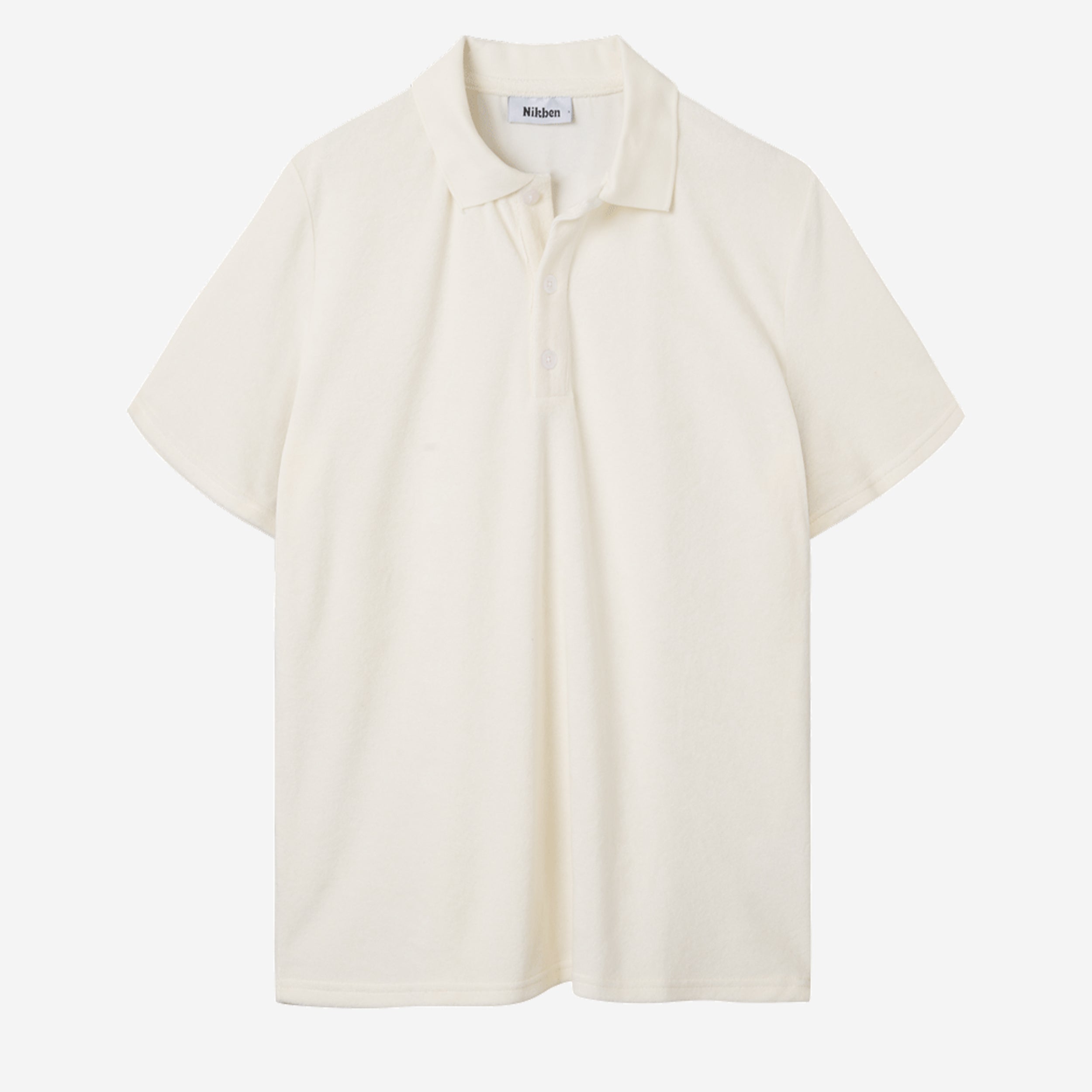 White short sleeve piké shirt in terry toweling fabric.