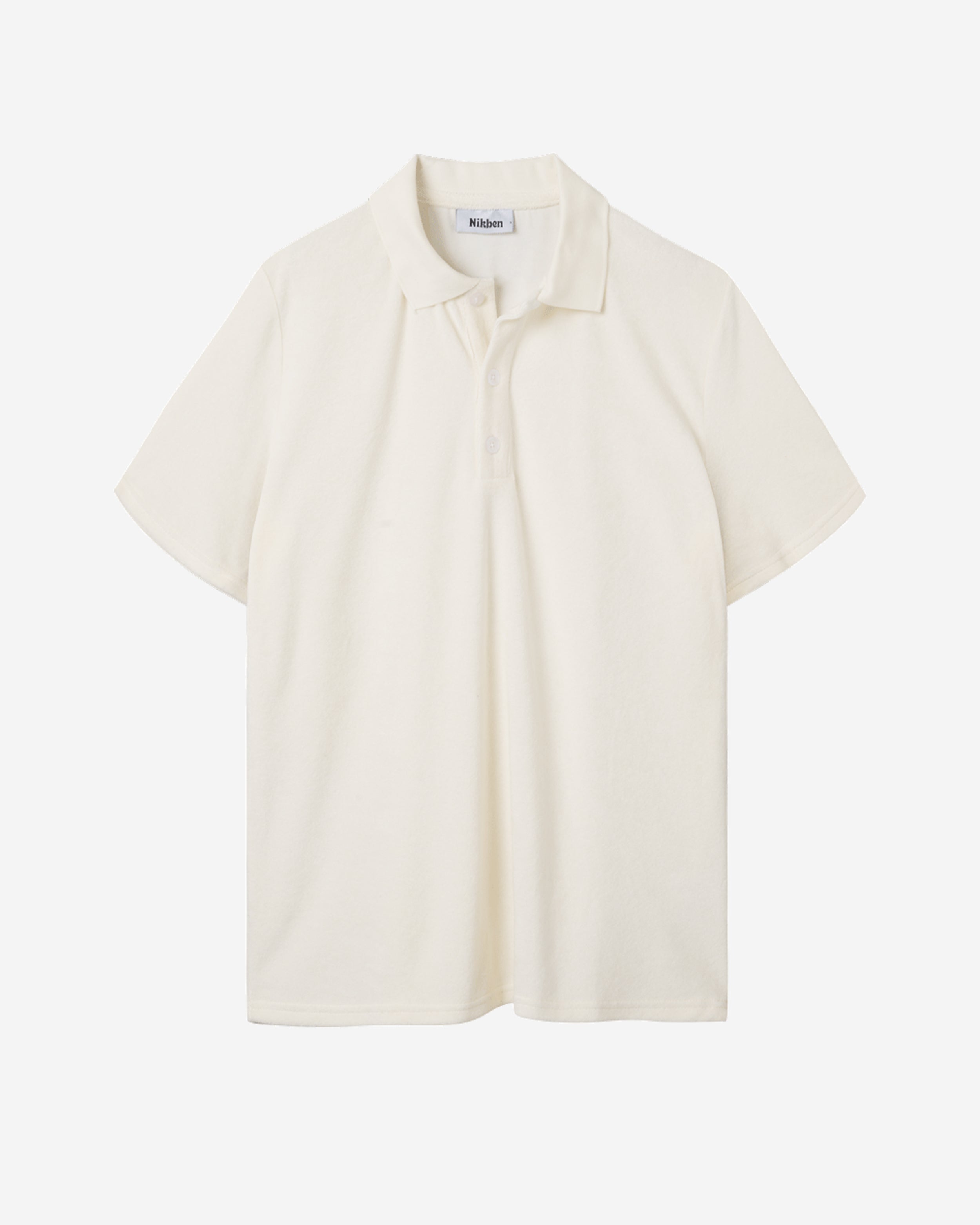 White short sleeve piké shirt in terry toweling fabric.