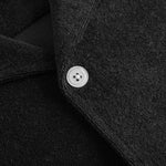 White button on black Terry toweling shirt