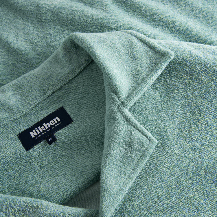 Collar on green Terry toweling shirt