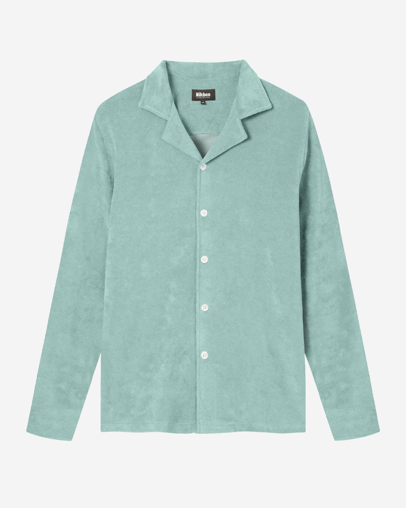Green long sleeve shirt with white buttons