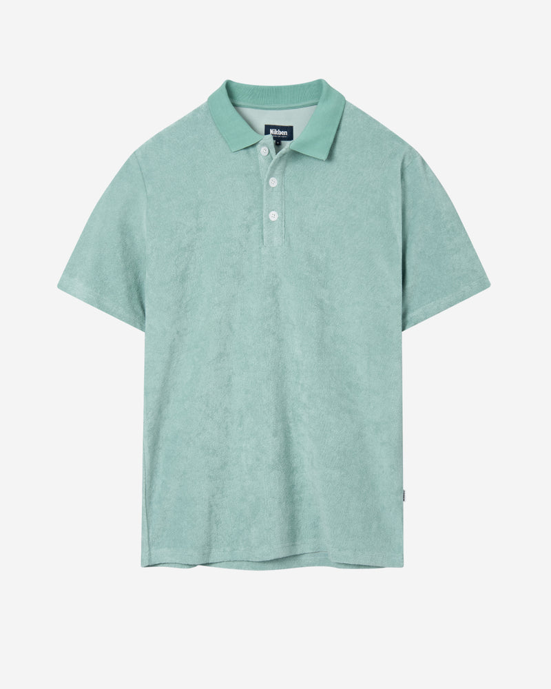 Grey-green short sleeve piké shirt in terry toweling fabric.