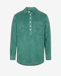 Green long sleeve shirt in terry toweling fabric with half button closure and one chest pocket