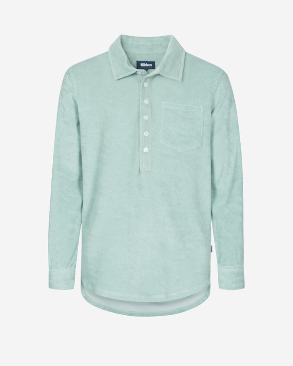 Grey-green long sleeve shirt in terry toweling fabric with half button closure and one chest pocket
