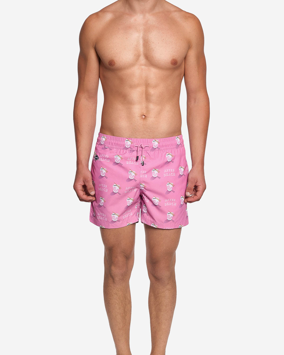 Model wearing pink printed swim trunks