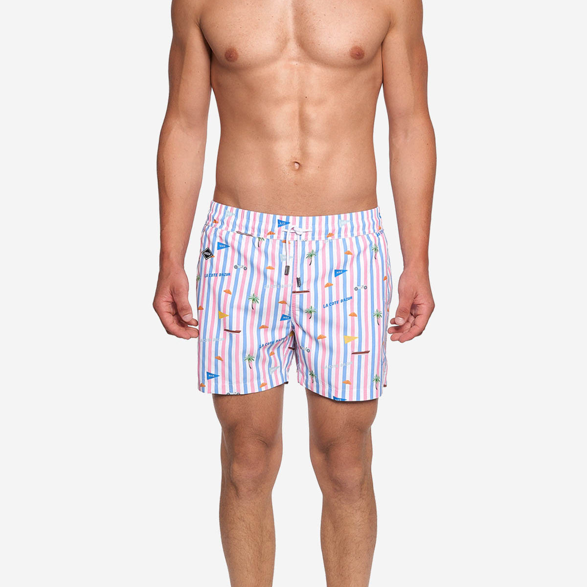 Model wearing striped printed mid length swim trunks