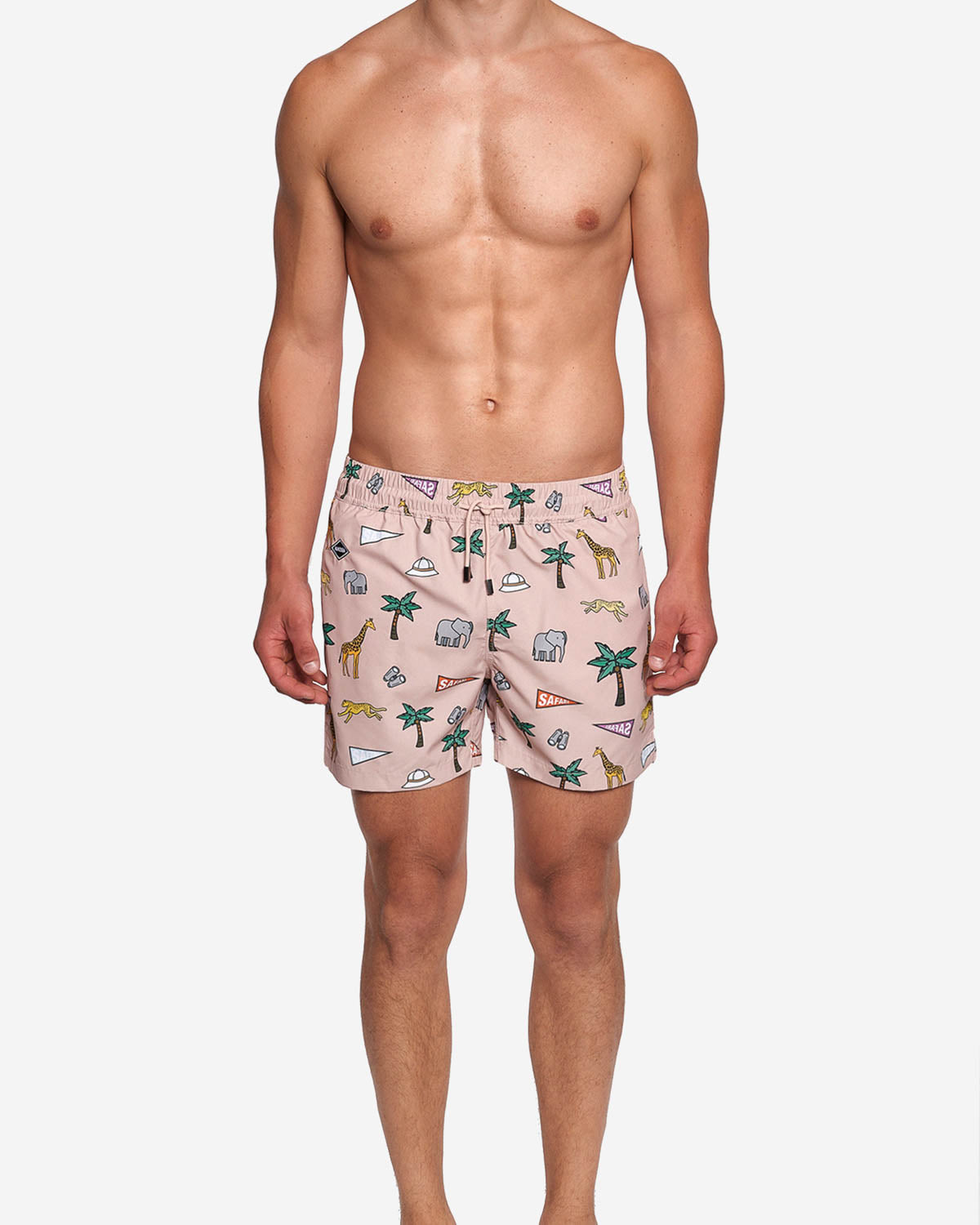 Model wearing beige swim trunks with multicolored safari print