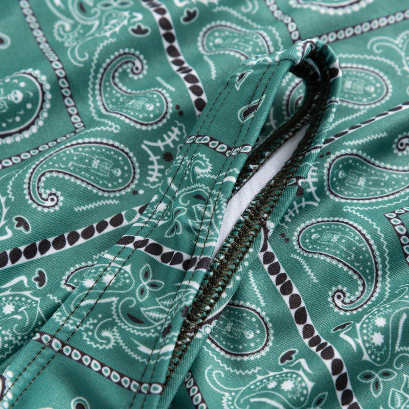 Close up on green patterned swimsuit