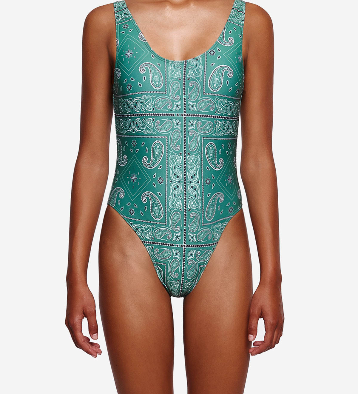 Model wearing green patterned swimsuit