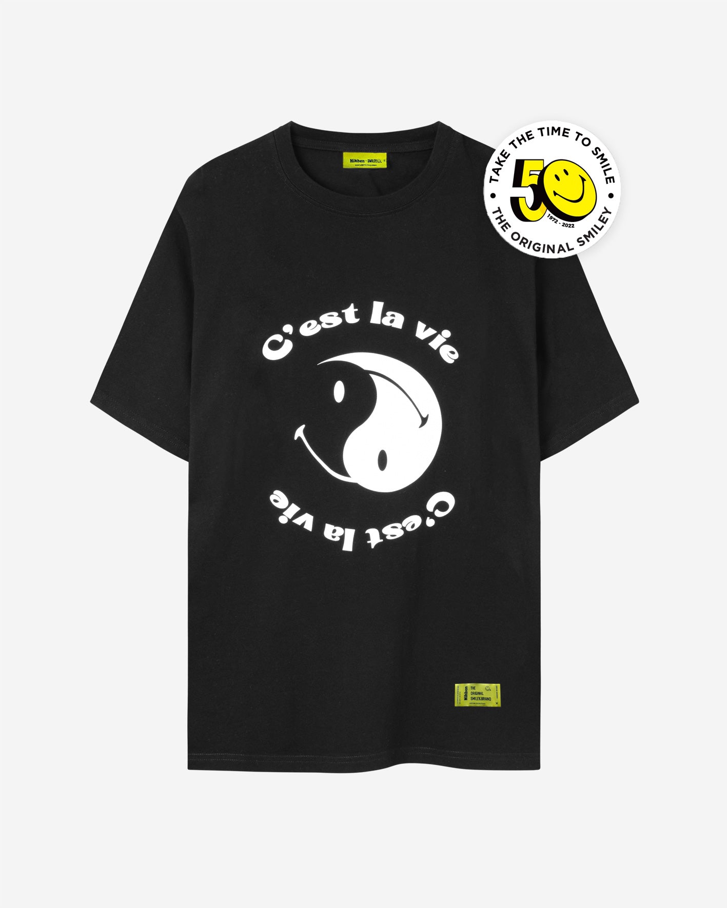 Black t-shirt with white smiley print and text