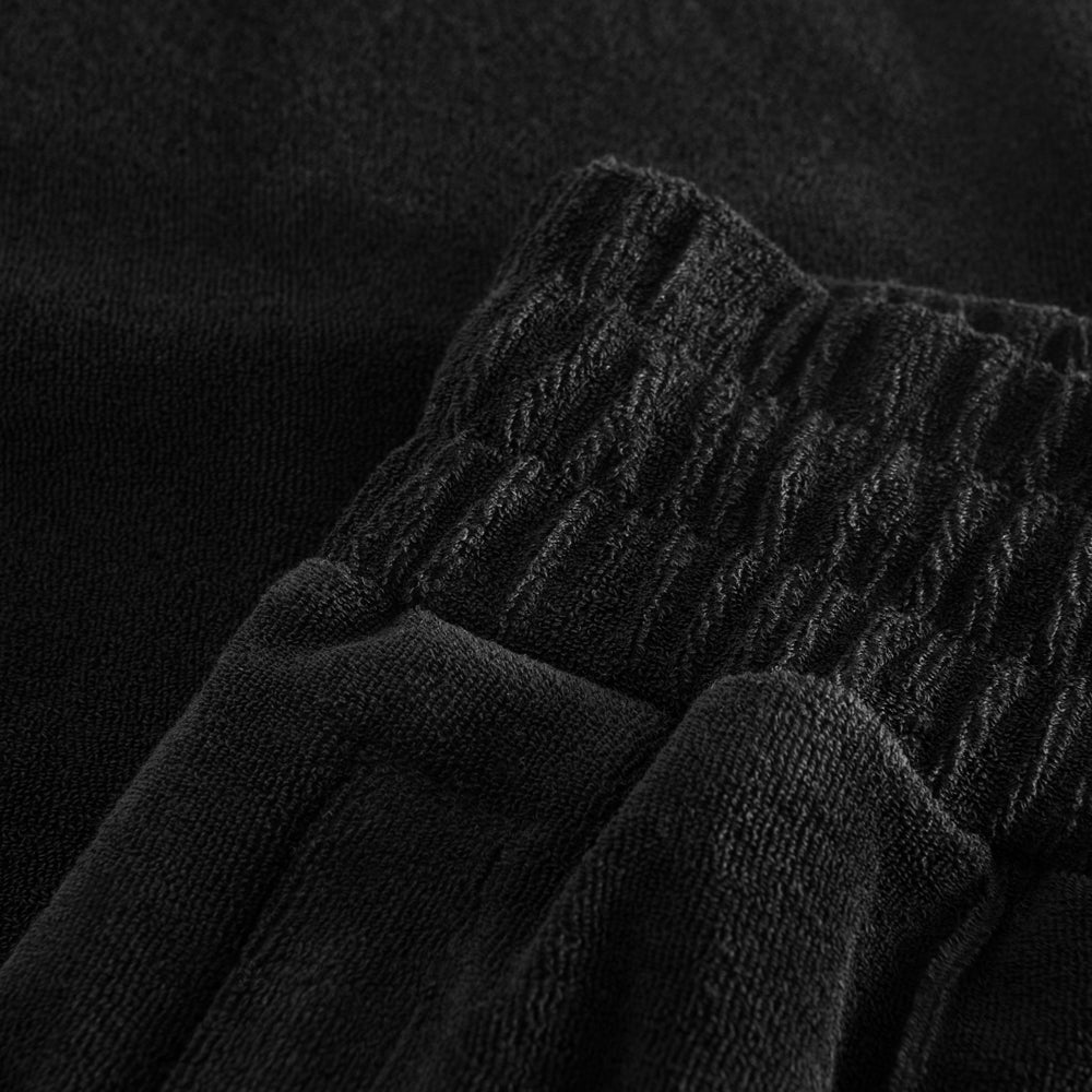 Close up black terry toweling pants
