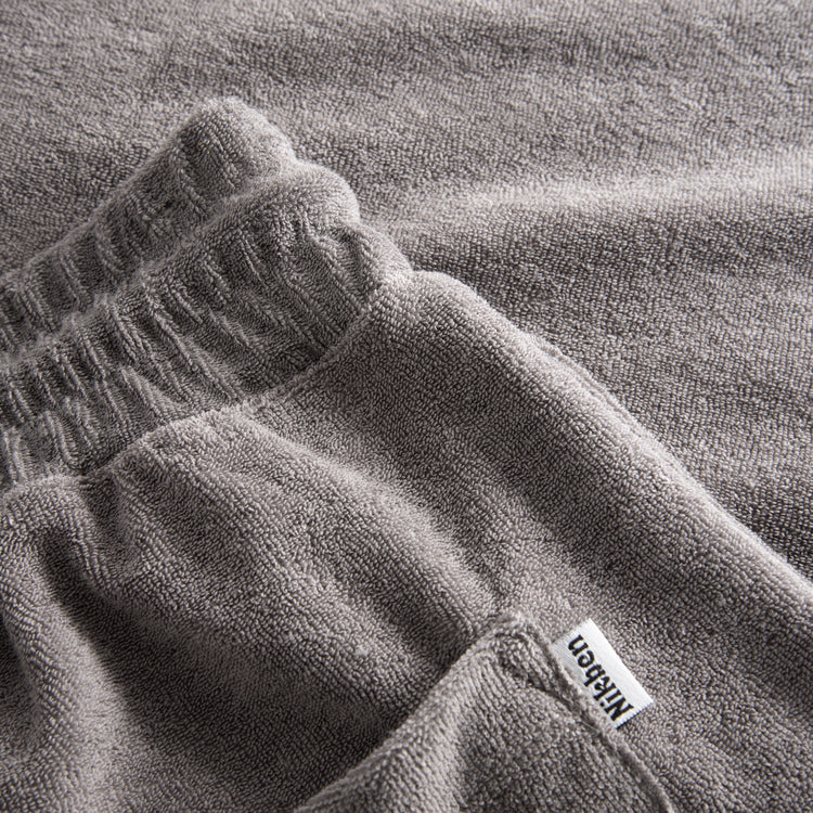 Close up of grey shorts in Terry toweling fabric