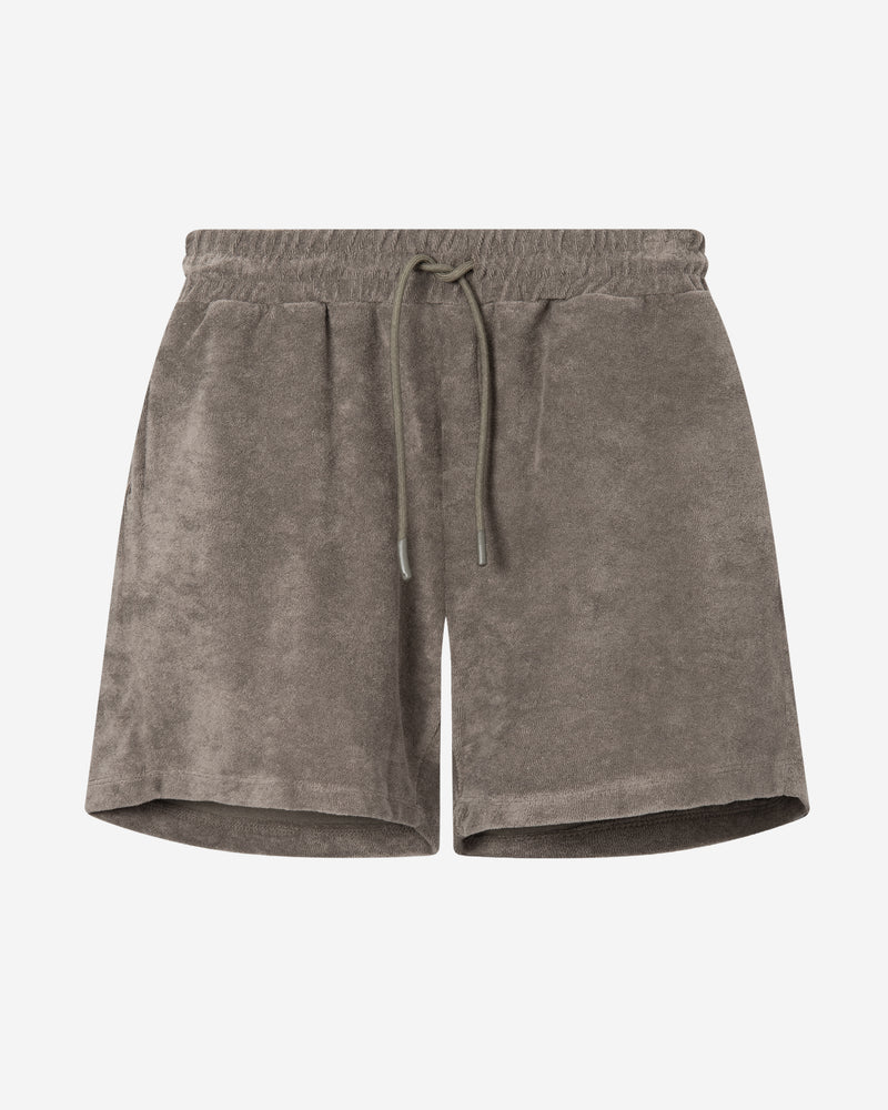 Brown mid length shorts in terry toweling fabric with drawdtring and two side pockets.